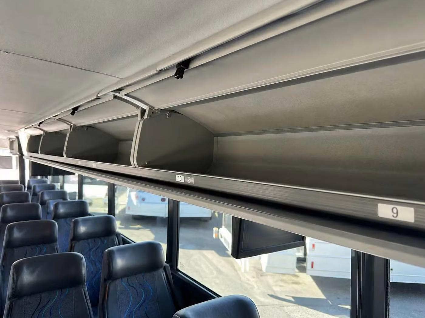 fishers 25 passenger minibus overhead storage