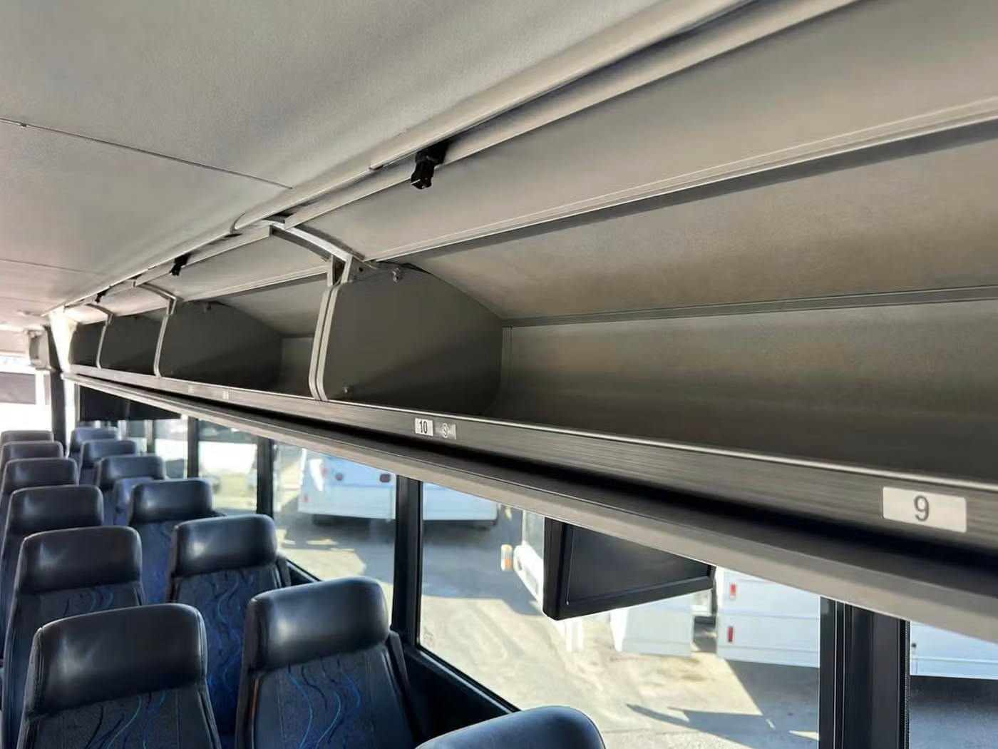 fishers 28 passenger minibus overhead storage