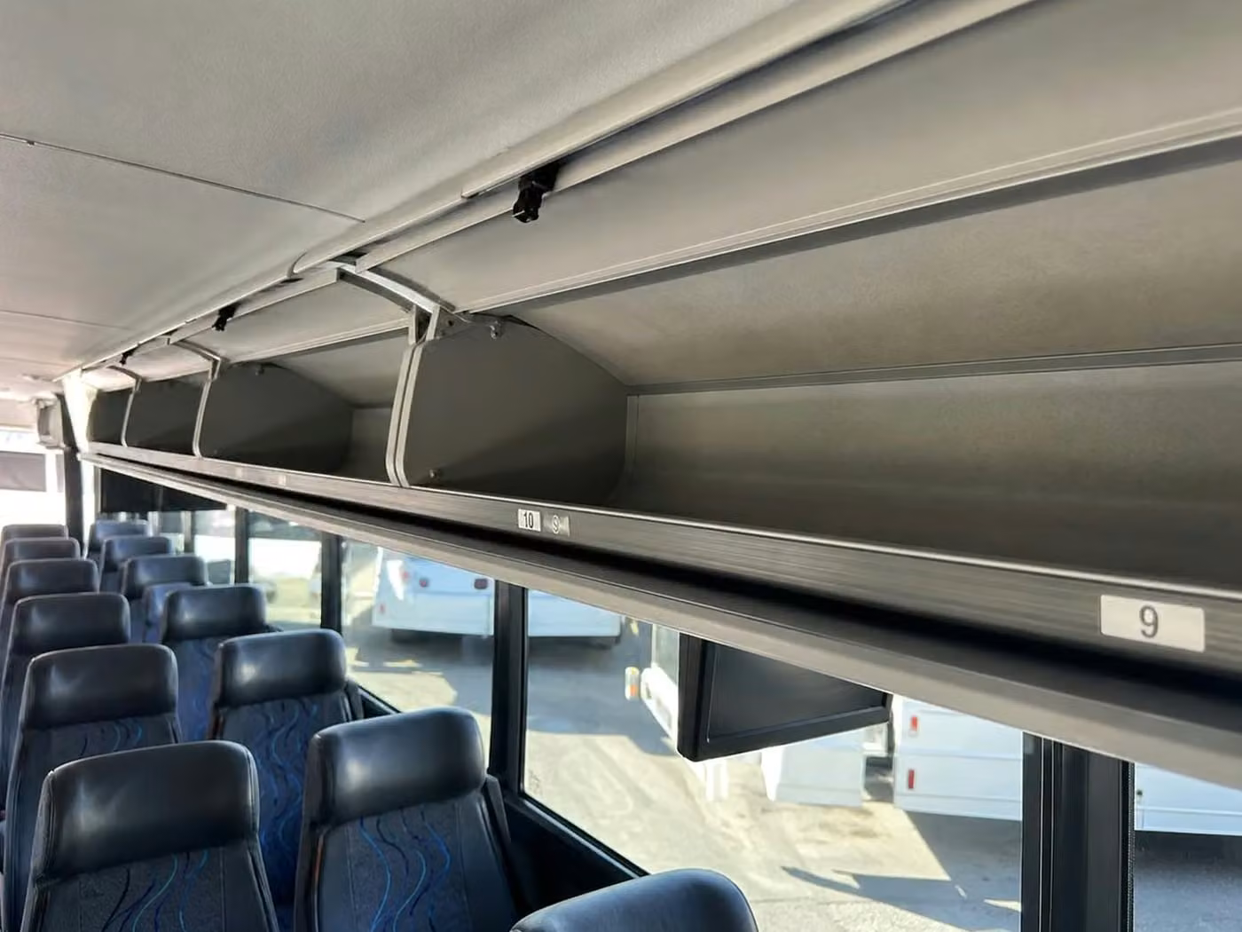 fishers charter bus overhead storage